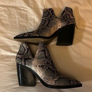 Lightly worn Vince Camuto block heel faux snake skin leather ankle boots.
